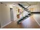 The view of the entryway reveals the home's staircase with new carpet at 530 Sellers Pl, Henderson, NV 89011