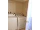 Efficient laundry room featuring a washer and dryer, offering convenience for household chores at 530 Sellers Pl, Henderson, NV 89011