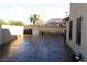 Spacious outdoor space showcasing a large patio, well-kept walls and patio furniture at 5381 Awbury Ave, Las Vegas, NV 89110
