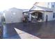 The backyard has ample space for entertaining with a covered patio and plenty of concrete at 5381 Awbury Ave, Las Vegas, NV 89110