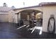 Outdoor living at its finest, with this covered patio featuring comfortable seating and protection from the elements at 5381 Awbury Ave, Las Vegas, NV 89110