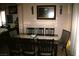 The dining room includes a large table and chairs, perfect for Gathering meals and gatherings at 5381 Awbury Ave, Las Vegas, NV 89110