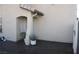 Welcoming side entrance with a covered entryway, providing sheltered access and enhanced curb appeal at 5381 Awbury Ave, Las Vegas, NV 89110