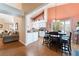 Bright, open-concept floor plan combining the kitchen, dining, and living areas at 5528 Apache Wells Way, Las Vegas, NV 89130
