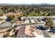 Expansive aerial view of a residential community, showcasing well-maintained homes and lush landscaping at 5604 Ocean Pines Cir, Las Vegas, NV 89130