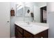 Bright bathroom featuring large mirror, vanity, and tile floors at 5927 Tropical Palm Ct, North Las Vegas, NV 89031