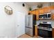 Modern kitchen features updated appliances, cabinet storage, and a functional design for efficient meal preparation at 5927 Tropical Palm Ct, North Las Vegas, NV 89031