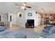 View of the open-concept layout highlighting the seamless flow between the living room, kitchen, and dining area at 5927 Tropical Palm Ct, North Las Vegas, NV 89031