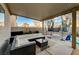 Relaxing back patio with ample seating and a trampoline at 6104 Talbot Springs Ct, North Las Vegas, NV 89081