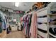 Spacious walk-in closet with ample storage and organizational options at 6104 Talbot Springs Ct, North Las Vegas, NV 89081