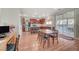 Open concept kitchen featuring stainless steel appliances, granite countertops, and a breakfast bar with seating at 6104 Talbot Springs Ct, North Las Vegas, NV 89081