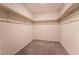 Large walk-in closet with ample shelving and neutral walls, providing plenty of storage space at 6129 Rose Springs Ave, Las Vegas, NV 89130