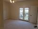 Bright bedroom with a private balcony and great natural light at 7261 Obannon Dr, Las Vegas, NV 89117