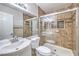 Bathroom featuring a shower with sliding doors, and a single sink vanity at 8304 Esmont Ln, Las Vegas, NV 89117