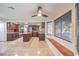 Spacious kitchen and eating nook offer backyard view and built-in bench seating at 8304 Esmont Ln, Las Vegas, NV 89117