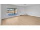 Living area with modern flooring and large window at 909 Hazard Ave, Las Vegas, NV 89108