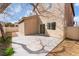 The backyard features a concrete patio, a privacy fence, and minimal landscaping at 9119 Brilliant Prairie Ct, Las Vegas, NV 89149