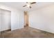 Bedroom featuring carpet, a window and a closet with sliding doors at 9119 Brilliant Prairie Ct, Las Vegas, NV 89149