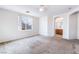 Bright bedroom with plush carpeting with attached bathroom at 9119 Brilliant Prairie Ct, Las Vegas, NV 89149