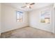 Carpeted bedroom features dual windows that bring in lots of natural light at 9119 Brilliant Prairie Ct, Las Vegas, NV 89149