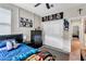 Bedroom with closet, posters, and full bed at 9675 Bold Skye Ave, Las Vegas, NV 89166