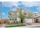 Contemporary two-story home with drought-tolerant landscaping and a paver driveway at 9675 Bold Skye Ave, Las Vegas, NV 89166