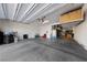 Spacious garage with ample storage space and shelving units at 9675 Bold Skye Ave, Las Vegas, NV 89166