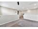 Spacious hallway featuring neutral walls, carpet flooring, and recessed lighting at 9675 Bold Skye Ave, Las Vegas, NV 89166