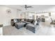 Spacious living area with tile flooring, a ceiling fan, and an open layout at 9675 Bold Skye Ave, Las Vegas, NV 89166