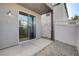 Enclosed back patio area with sliding glass door access to home at 10429 Amber Night St, Las Vegas, NV 89183