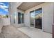 Enclosed back patio area with sliding glass door access to home at 10429 Amber Night St, Las Vegas, NV 89183