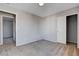 This bedroom features neutral walls, carpet, and a walk-in closet at 10429 Amber Night St, Las Vegas, NV 89183