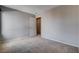 This bedroom features neutral walls and carpet at 10429 Amber Night St, Las Vegas, NV 89183