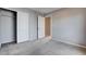 This bedroom features a sliding closet and a door leading to another room at 10429 Amber Night St, Las Vegas, NV 89183