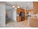 Well-lit kitchen with stainless steel appliances and tile flooring at 10429 Amber Night St, Las Vegas, NV 89183