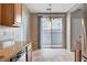 Kitchen with sliding door access to an outdoor patio area at 10429 Amber Night St, Las Vegas, NV 89183