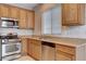 Cozy kitchen with stainless steel appliances and granite countertops at 10429 Amber Night St, Las Vegas, NV 89183