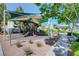 Shaded community playground featuring slides and climbing areas at 10429 Amber Night St, Las Vegas, NV 89183