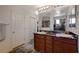 A spacious bathroom featuring a double sink vanity with modern fixtures at 1055 Admiral Emblem St, Henderson, NV 89015