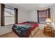 Bright bedroom with two windows and neutral carpet at 1055 Admiral Emblem St, Henderson, NV 89015