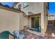 Private outdoor patio with brick pavers and a sliding glass door at 1055 Admiral Emblem St, Henderson, NV 89015