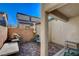 Enclosed patio area with brick pavers and barbecue at 1055 Admiral Emblem St, Henderson, NV 89015