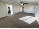 Open bedroom with carpet, a ceiling fan, and lots of natural light at 10715 York Manor Ave, Las Vegas, NV 89166