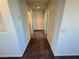 Hallway showcasing neutral colored walls and neutral carpeting at 10715 York Manor Ave, Las Vegas, NV 89166