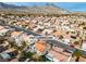 An aerial view showcasing a sprawling community of single-Gathering homes at 10801 Clarion Ln, Las Vegas, NV 89134