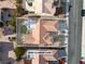 Aerial view showcases backyard with patio and neighboring houses at 10801 Clarion Ln, Las Vegas, NV 89134