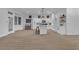 Large living area showcases bright lighting and a seamless flow into the kitchen at 10801 Clarion Ln, Las Vegas, NV 89134