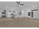 Expansive living area combines living, dining, and kitchen spaces, perfect for entertaining at 10801 Clarion Ln, Las Vegas, NV 89134
