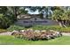 Entrance sign to Sun City Summerlin, a Del Webb Community, with colorful flowers and landscaping at 10801 Clarion Ln, Las Vegas, NV 89134