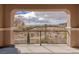 Private balcony offers scenic views of the desert landscape and golf course at 11241 Golden Chestnut Pl, Las Vegas, NV 89135